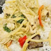 Green Curry · Spicy. Traditional Thai green curry with bamboo shoots, Thai eggplant, basil leaves and bell...