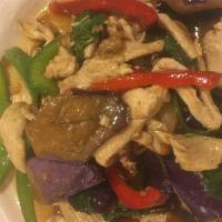 Pad Eggplant · Spicy. Stir-fried with Thai eggplant, basil leaves, red and green bell pepper, soy bean in a...