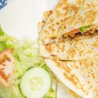 Quesadillas · You can choose. Chicken, steak, pastor, chorizo.
Served with sour cream and salad.