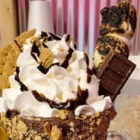 Campfire · Smores ice cream, with chocolate frosted rim covered in graham crackers topped with whip top...