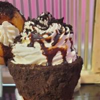 Hellhound · Mocha chocolate chip ice cream, chocolate rim with chocolate chips topped with doughnuts, ch...