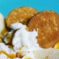 The Rake · Vanilla ice cream with a blended in banana, with nella wafers, a frosted vanilla rim with wh...