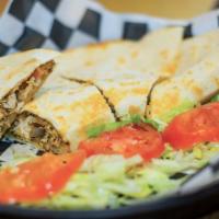 Chicken Quesadilla · Stuffed with grilled chicken, green peppers, onions, and mixed cheese. Served with a side of...