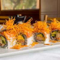 Honeymoon Roll · Inside lobster meat, avocado and mango topped with spicy tuna, crunchy sweet potato, and spe...