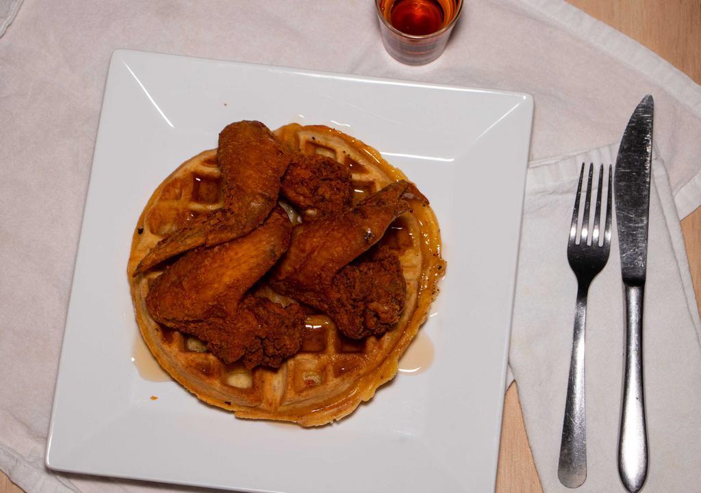 Chicken-N-Waffles · Crispy fried chicken on a golden Belgian waffle.