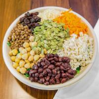 Protein Bowl · Kale base, quinoa, lentils, beans, chickpeas, brown rice, carrots, pumpkin seeds, and raisin...