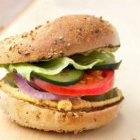 Veggie Sammy · Contains romaine lettuce, tomatoes, onions, cucumbers, capers, pickles, sprouts, avocado. Yo...