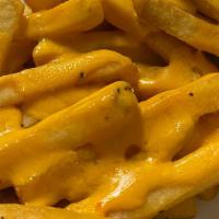 Cheezy Fries · With our world-famous cheez sauce.