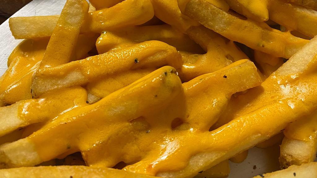 Cheezy Fries · With our world-famous cheez sauce.