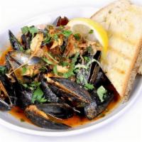 Mussels Fra Diavolo · Garlic, shallots, marinara sauce, red pepper flakes, fresh herbs, grilled baguette, Calabria...