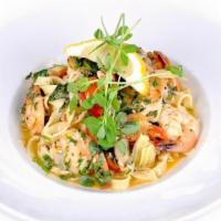 Scallop & Shrimp Tagliatelle · Pan seared scallops & shrimp sauteed with cherry tomatoes, garlic, chili peppers, spinach an...