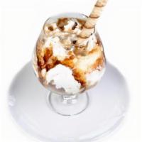 Affogato · Vanilla bean ice cream, caramel & chocolate sauce, whipped cream,. mini chocolate chips, top...