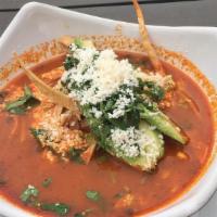 Chicken Tortilla Soup · Grilled chicken avocado fresh cheese cilantro and tortilla strips in a chile pepper broth. m...