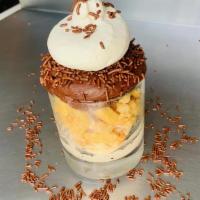 *New* Chocolate Frosted Cupcake · Campfire s'mores ice cream topped with doughy sugar cookie bites, chocolate buttercream fros...