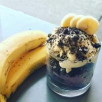 Off Pudding · Black raspberry cookie swirl ice cream topped with fresh bananas, vanilla pudding and crushe...