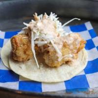 Fish Taco · Most popular. With shredded cabbage and creamy red salsa.