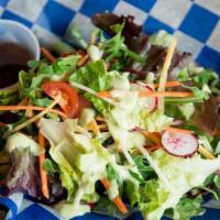Mixed Green Salad · With carrot, radish, red onion, and tomatoes and your choice of creamy garlic avocado dressi...