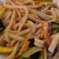 Yaki Seafood Udon · Stir fried thick wheat noodles with vegetable and seafood.