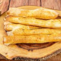 Bread Sticks · Brushed with garlic sauce, sprinkled with cheese, parsley and served
with homemade marinara ...