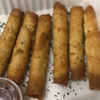 6 Pieces Cigar Borek · Feta cheese with parsley wrapped in homemade dough and deep fried.