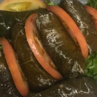 Stuffed Grape Leaves · 6 pieces. Vine leaves stuffed with rice.