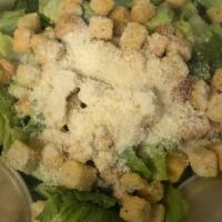 Caesar Salad · Romaine lettuce, tomatoes, cucumbers, croutons and shaved parmesan cheese with Caesar dressi...
