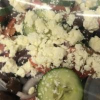 Greek Salad · Romaine lettuce, tomatoes, onions, cucumbers, pepperoncinis, kalamata olives, feta cheese & ...