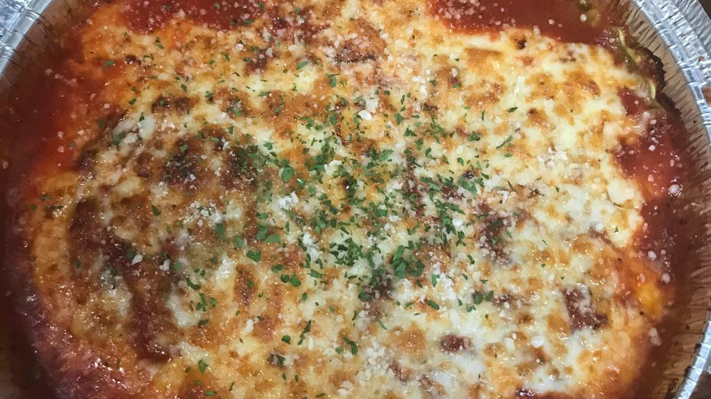 Cheese Manicotti · Pasta stuffed with ricotta and mozzarella cheeses, baked in marinara sauce and topped with more mozzarella. Served with a slice of garlic bread.