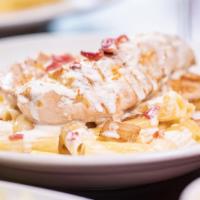Chicken Carbonara · A grilled chicken breast sautéed with bacon and white onion, then tossed with ziti in our cr...