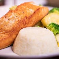 Grilled Salmon · A fresh, never-frozen grilled salmon filet served with your choice of one side and a soup or...