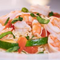 Mediterranean Shrimp · Shrimp sautéed in a white wine sauce with yellow squash, zucchini, tomatoes, minced garlic, ...