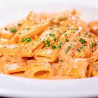 Ziti Rosa · Ziti pasta tossed in a delicious blend of our creamy, made-fresh-daily Alfredo and our signa...
