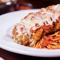 Eggplant Parmesan · Fresh slices of lightly breaded eggplant topped with marinara herb sauce and melted mozzarel...