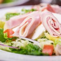 Chef Salad · Romaine and iceberg lettuce with slices of ham, salami, and provolone topped with tomatoes, ...