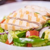 Grilled Chicken Salad ⭐️ · Romaine and iceberg lettuce topped with bell pepper, red onion, tomatoes, and a sliced grill...