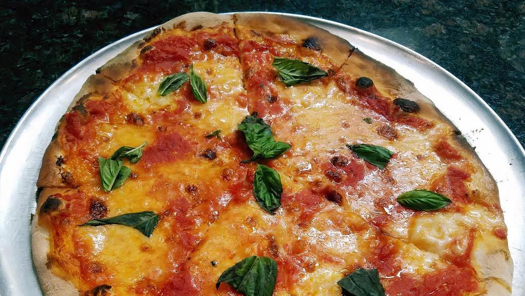 Margherita Pizza · Fresh Mozzarella, tomato sauce, and basil.