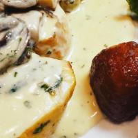 Chicken Rollatini · Pounded and stuffed chicken breast, prosciutto, spinach, Fontina cheese, in a creamy mushroo...