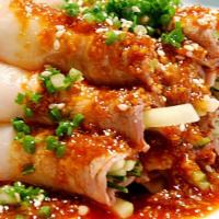  Pork Belly With Garlic Sauce 蒜泥白肉 · Med hot.