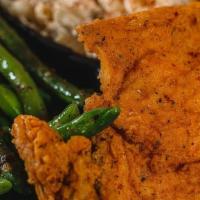 Turkey Chops* · Southern fried turkey chops marinated in our house blended seasoning