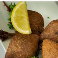 Kibbee Balls · Stuffed with sautéed ground meat and pine nuts.