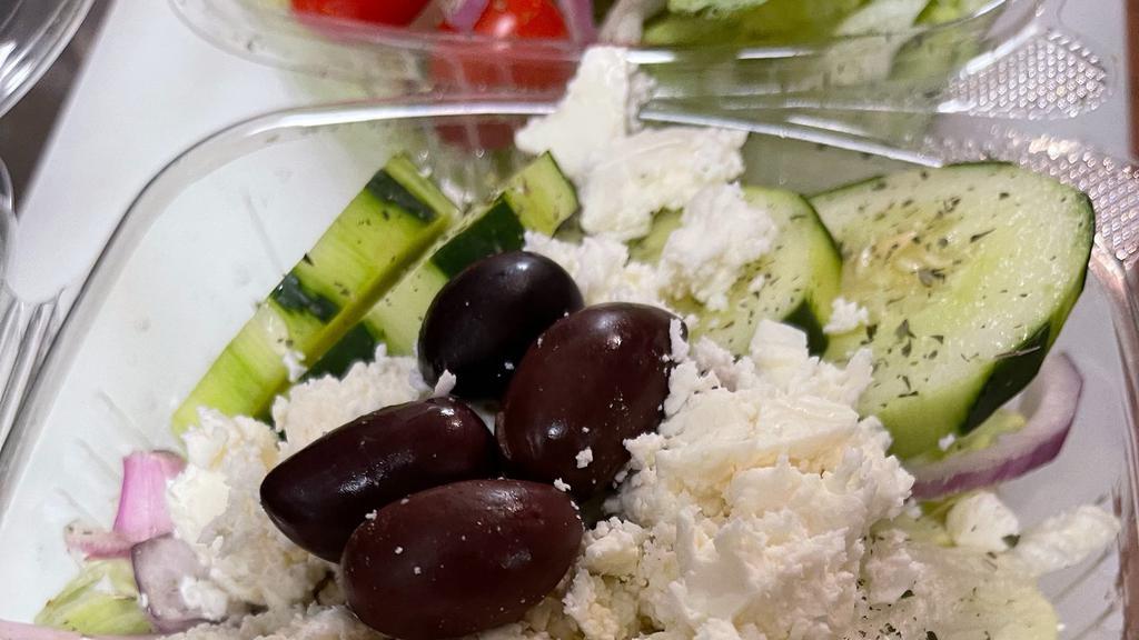 Greek · Garden salad with feta cheese and Greek olives