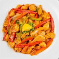 Che Sautéed Chicken · Onions and peppers in a garlic lemon sauce served with house rice pilaf.
