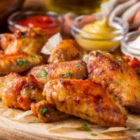 Honey Mustard Wings · Perfect party wings with delightful honey mustard sauce. Comes with celery and bleu cheese.