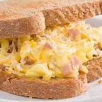 Egg Sandwich With Cheese · Fresh egg and delicate cheese on toast