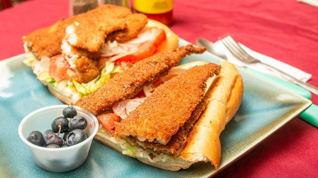 Fresh Fish Hoagie, Whiting · Fresh, lightly breaded fried fish on a long roll with lettuce, tomato, onion, (mayo, ketchup, hot sauce by request) and you can add cheese. Amazing