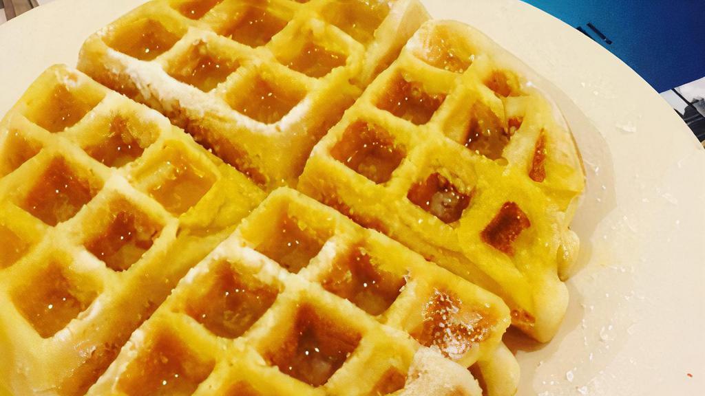 Belgian Waffle · House battered Belgian Waffle with butter and powdered sugar!!Add fruits or with egg for an additional charge.