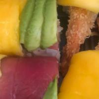 Mango Roll · Tempura shrimp, mango, cucumber inside, top with tuna, avocado and mango.