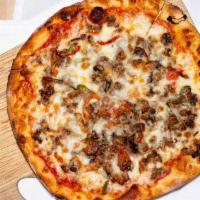 Steak Bomb Pizza · Tomato Base, Steak with Peppers Onions, Mushrooms & Mozzarella Cheese.