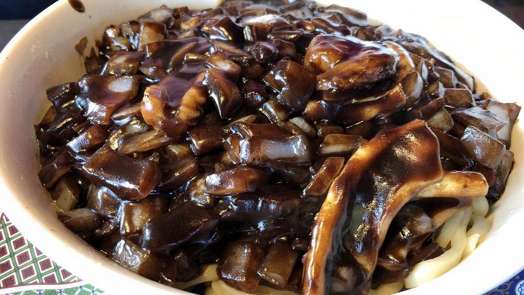 Noodles In Black Bean Sauce · Contains squid and shrimp.