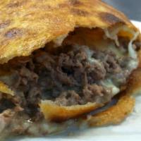 Steak & Cheese Calzone · Shaved steak, peppers, onions and mozzarella cheese. Consuming raw or undercooked meat, poul...